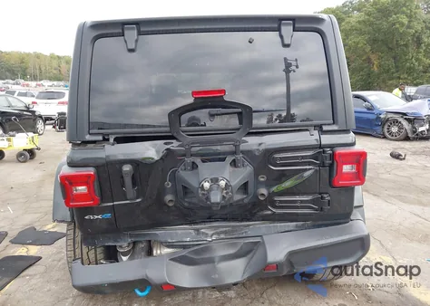 2023 Jeep Wrangler 4Xe Sahara 4X4 from USA, damaged, VIN 1C4JJXP64PW630633